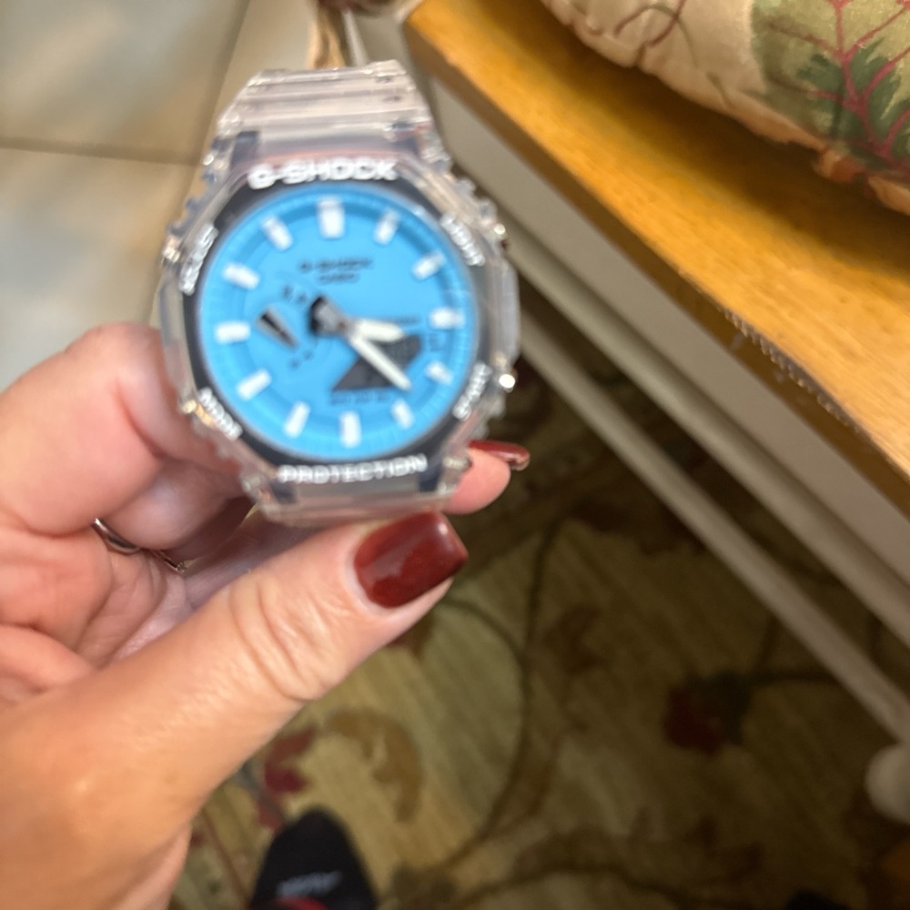 G-Shock Transparent and Blue Timepiece.
